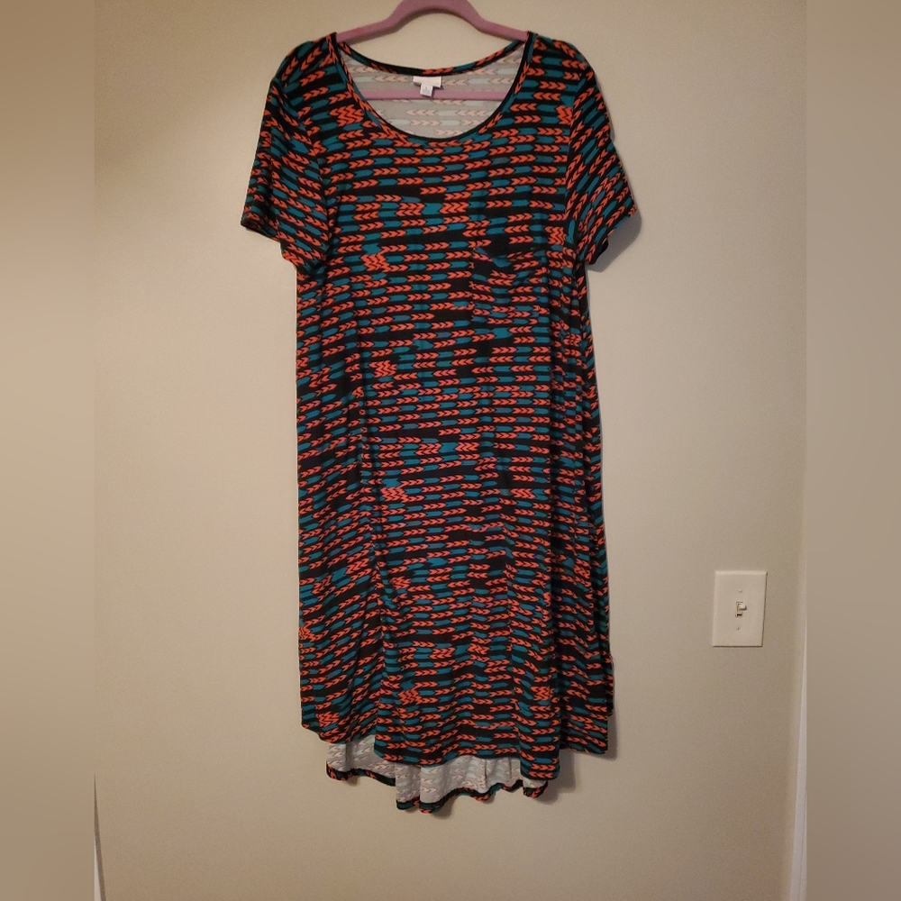 Lularoe Carly with pocket, size Large, black with teal & orange arrows.